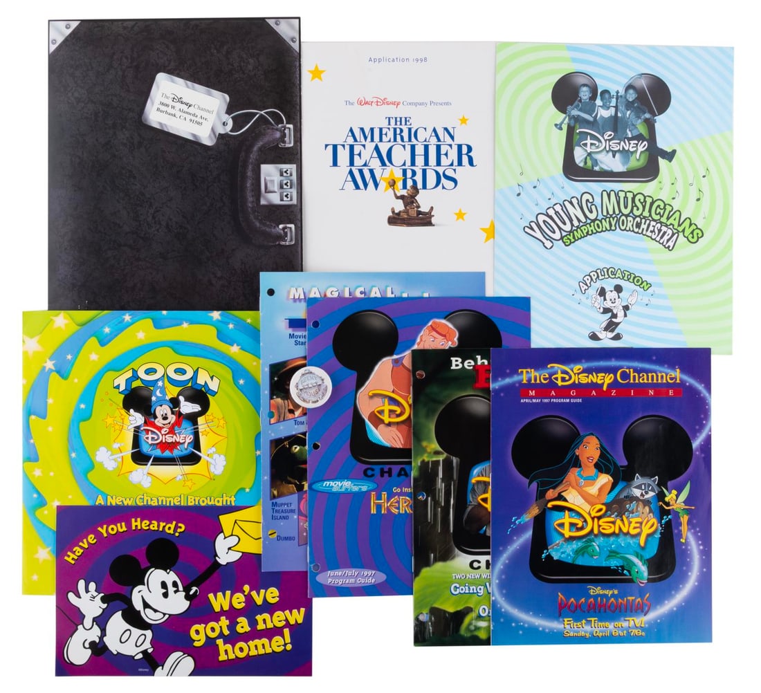 A Collection of 1990s Disney Channel Ephemera.: (Disney, 1997-98) A collection of Disney Channel ephemera from the late 1990s. Included are five programming guides with only one of them a duplicate, a Toon Disney debut pamphlet, application