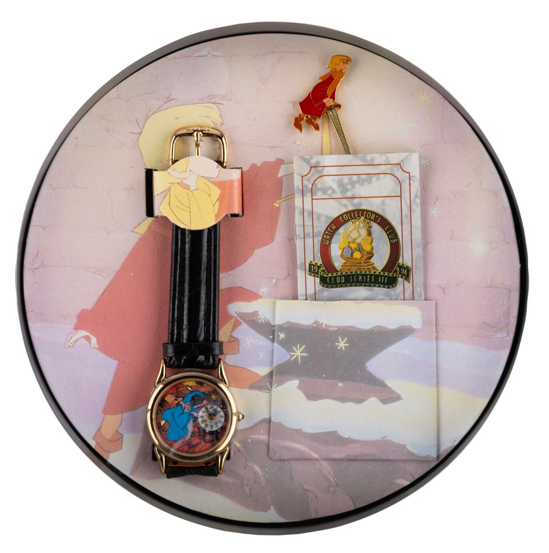 A "The Sword in the Stone" Watch Collector's Club Set.: (Disney, 1994) A "The Sword in the Stone" watch from the Watch Collector's Club Series III. The face features Merlin and a spinning clock. The watch comes with its original tin packaging,