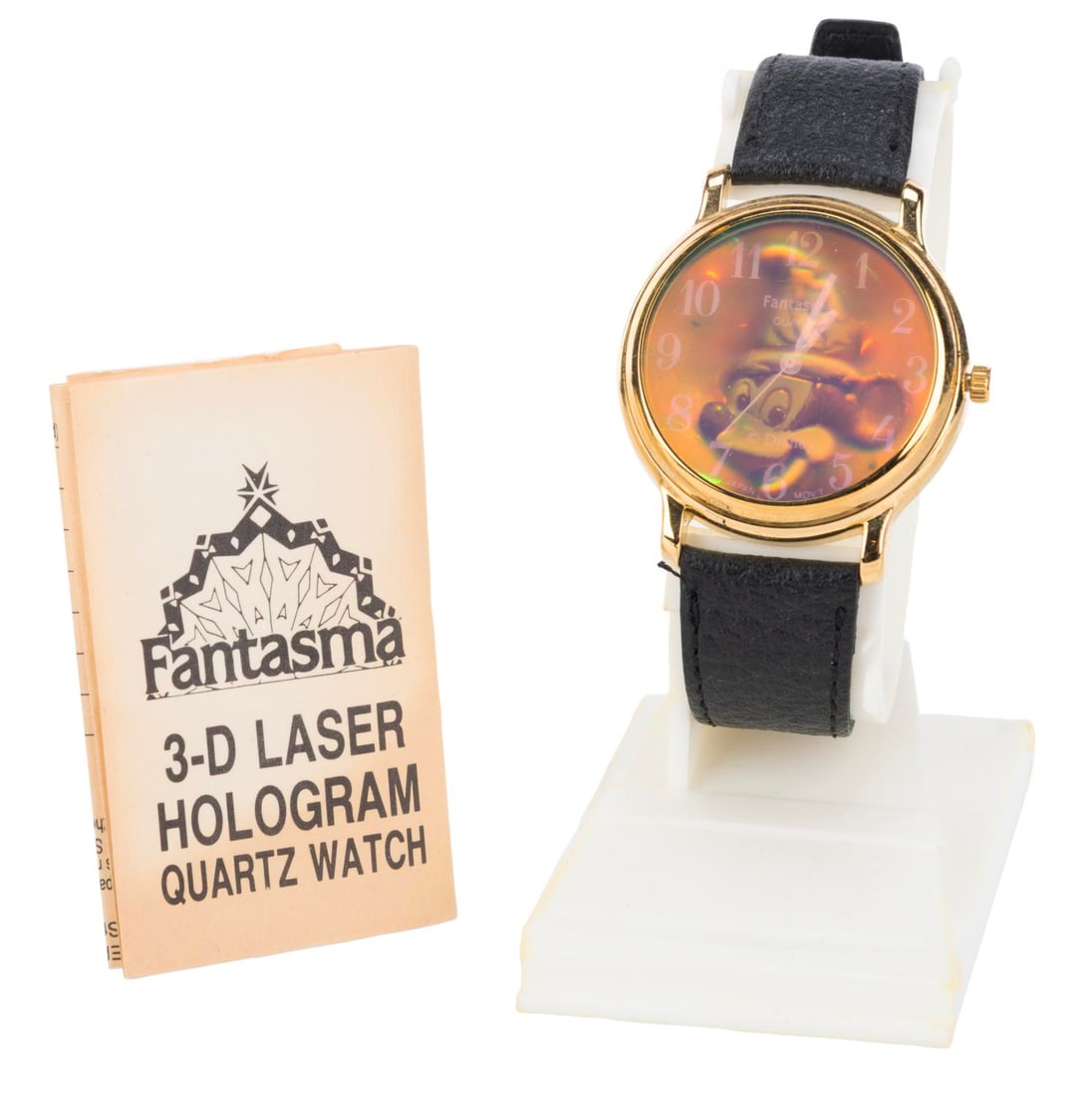 A "Fantasma" 3-D Laser Hologram Quartz Watch.: (Fantasma, 1990) A "Fantasma" 3-D laser hologram quartz watch with a gold-colored case and a black band. The watch face features a holographic image of Mickey Mouse wearing a sorcerer's hat. The