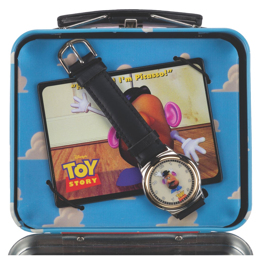 A "Toy Story" Mr. Potato Head Watch in Lunchbox.: (Disney/Fossil, 1996) A "Toy Story" Mr. Potato Head watch, certificate of authenticity, and tin lunchbox. The watch is a limited edition of 10,000 with the "Toy Story" logo and a serial number on the 