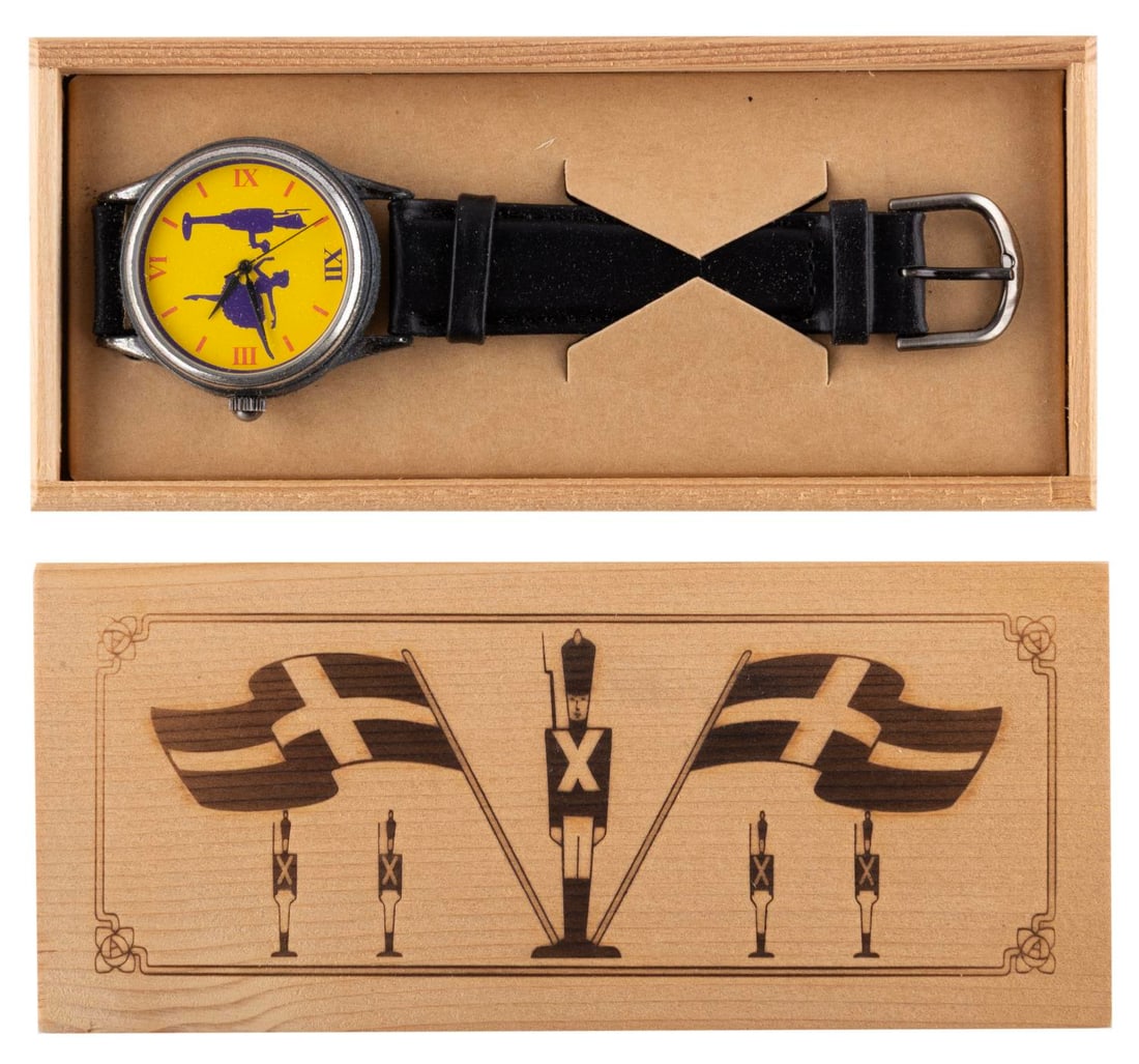 A "Fantasia Continued" Cast Member Watch in Box.: (Disney, 1999) A Steadfast Tin Soldier wristwatch in its original wooden box, given to the "Fantasia Continued " (Fantasia 2000) crew as a Fourth of July present. The watch and box are in fine conditi