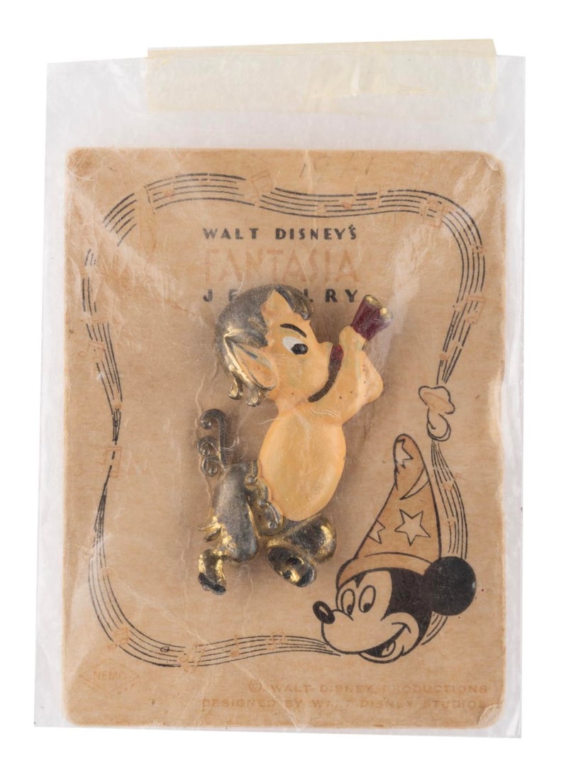 A Very Early "Fantasia" Faun Pin on Card. (1 of 1)