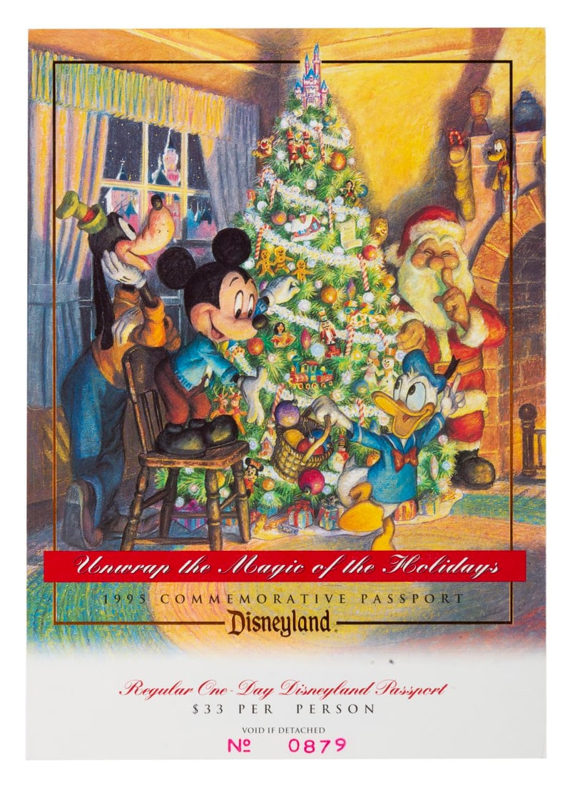 A 1995 Disneyland Holiday Commemorative Passport.: (Disneyland, 1995) A commemorative Unwrap the Magic of the Holidays passport for one-day admission to Disneyland, numbered 0879. Measuring 5" x 7", the holiday-themed passport is in very good