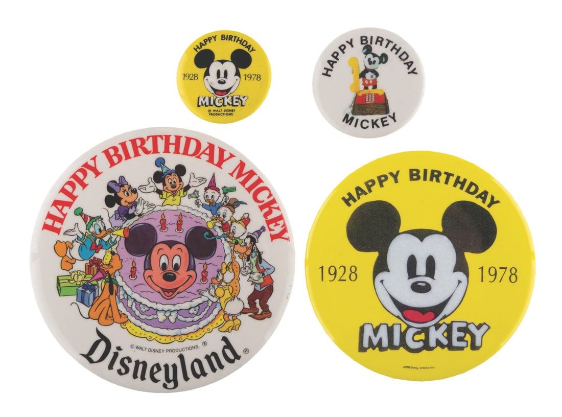 A Collection of "Happy Birthday Mickey" Buttons.: (Disney, 1970s-90s) A collection of four "Happy Birthday Mickey" pinback buttons. Two are from Mickey?s 50th birthday celebration, one is from a Disneyland celebration, and the fourth features the