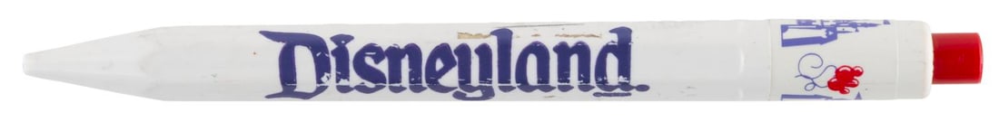 A Disneyland Souvenir Pen.: (Disneyland, 1970s-90s) A clickable Disneyland souvenir pen. The pen did not work when tested, requiring new ink. Measuring 6.5" long, the pen is in fair condition with scuffs, scratches, wear, discol