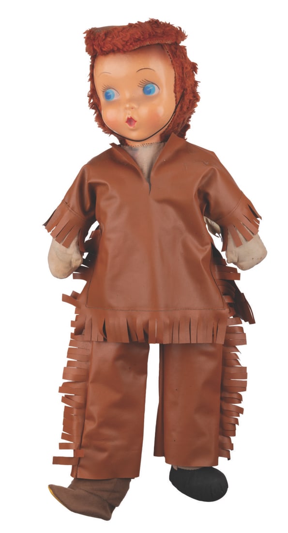 A Gund Davy Crockett Frontierland Doll.: (Gund, 1950s) A rare Disneyland souvenir of Frontierland Davy Crockett doll. Measuring 11" x 4" x 23" tall, the doll is in very good condition with wear from use and age, including stains and