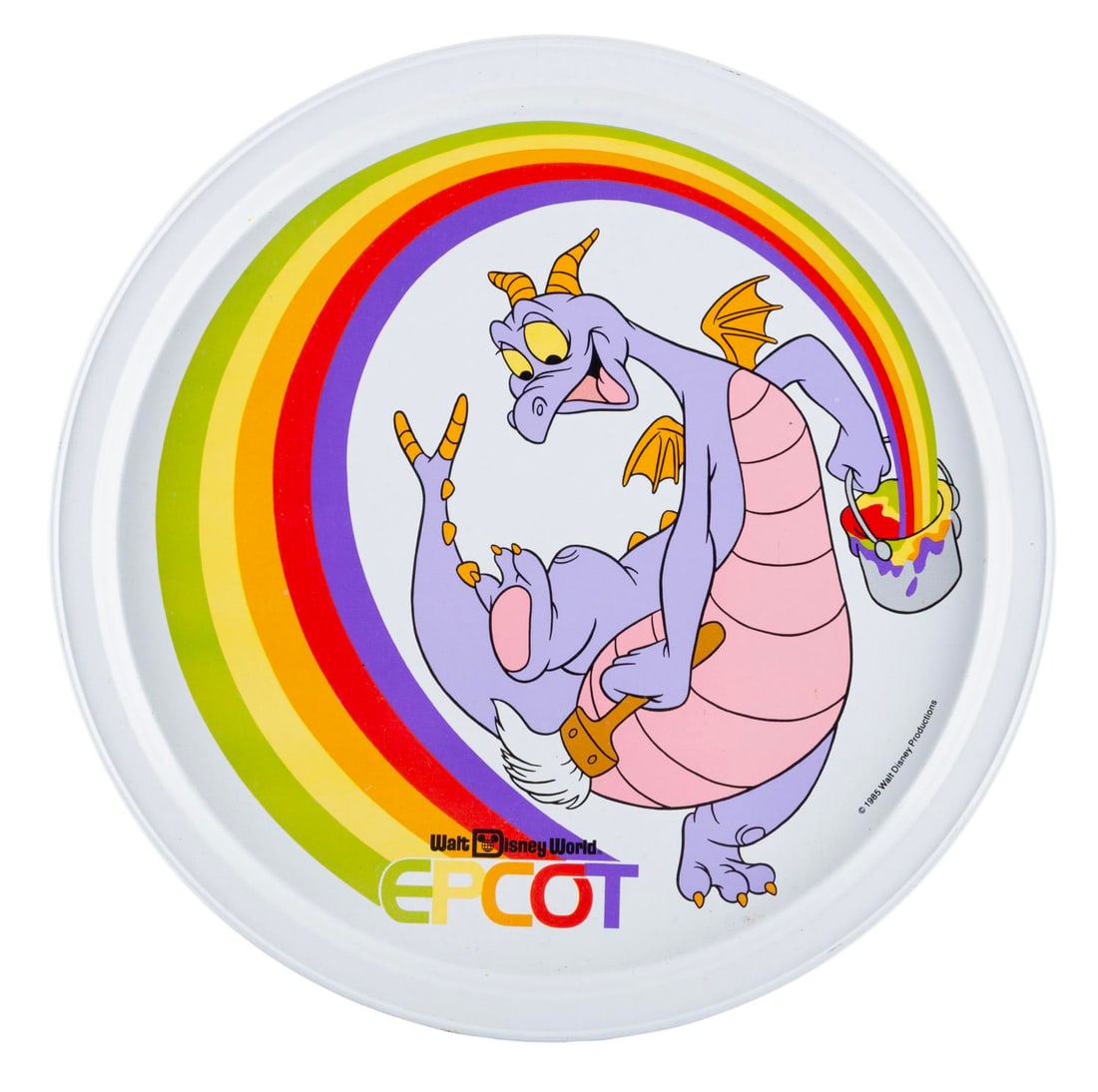 An EPCOT Figment Plate.: (EPCOT, 1985) A decorative EPCOT tray featuring Figment from Journey into Imagination. Measuring 10.75" in diameter, the tin tray is in very good condition with surface scratches and a pricing