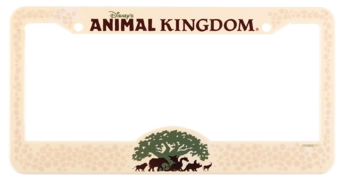 A Disney's Animal Kingdom License Plate Frame.: (Disney's Animal Kingdom, 2000s) A leopard-print license plate cover from Disney's Animal Kingdom. Measuring 6.25" x 12.25", the license plate cover displays in very good condition with light wear, sc