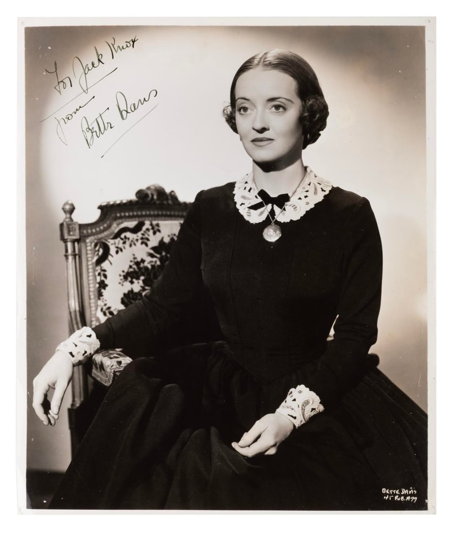 A Bette Davis Signed Photograph.: (Warner Bros., 1940) An autographed photo of Bette Davis in "All This and Heaven Too," which was nominated for Best Picture in the 1940 Academy Awards. Measuring 8" x 10", the photo is signed with a
