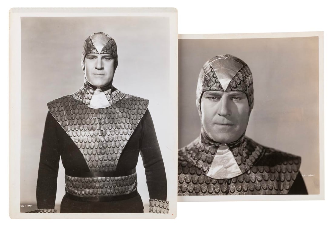 A Pair of "The Purple Monster Strikes" Publicity Photos.: (Republic Pictures, 1945) Two portraits of actor Roy Barcroft as the title character in the Republic serial "The Purple Monster Strikes." Measuring 8" x 10", the photos are in very good condition