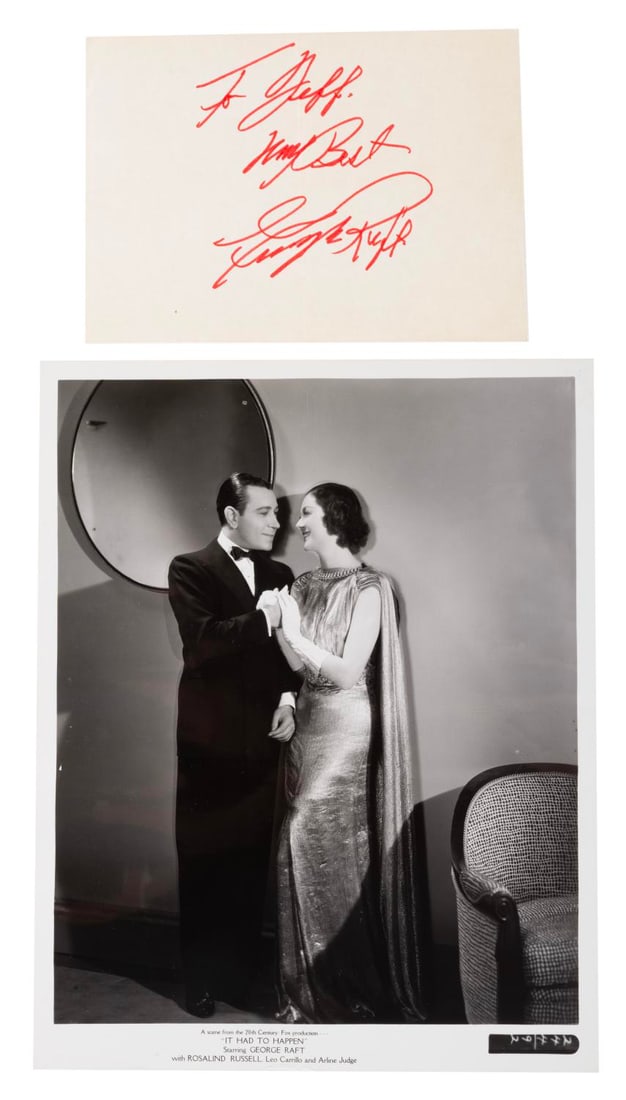 A George Raft Autograph and Photo.: (20th Century-Fox, 1936) A clipped autograph from actor George Raft, paired with a photo of him with Rosalind Russell in "It Had to Happen." The autograph with dedication on 4.5" x 6.25" paper is in
