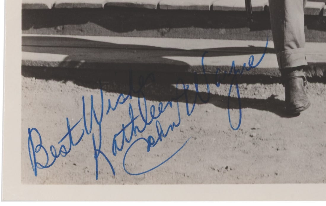 A John Wayne Signed Photograph. - 2