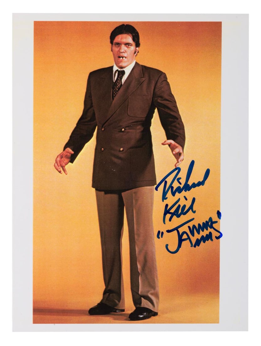 A Richard Kiel as "Jaws" Signed Photo Print.: (Kiel, 1990s) A signed digital photo print of Richard Kiel as "Jaws" from the James Bond films. Kiel played Bond's largest adversary in both "The Spy Who Loved Me" and "Moonraker." Measuring 8.25" x