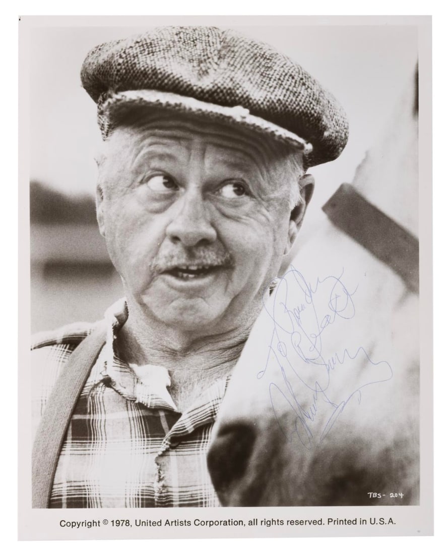 A Mickey Rooney "The Black Stallion" Signed Photograph.: (United Artists, 1978/79) A signed photograph of actor Mickey Rooney in 1979?s "The Black Stallion." Rooney was nominated for Best Performing actor for his portrayal of Henry Dailey in this film. The