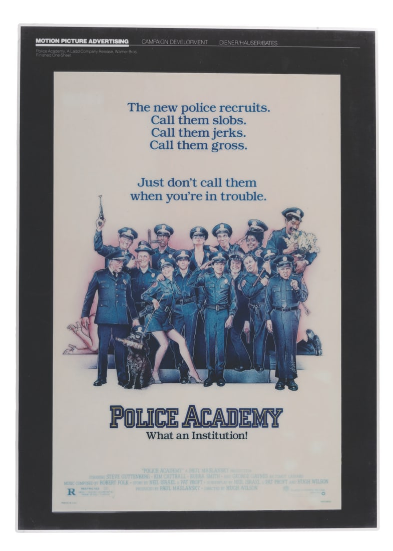 A "Police Academy" Movie Poster Presentation Board.: (Warner Bros., 1984) A laminated presentation board of the one-sheet for "Police Academy." Measuring 12.25" x 17.25", the laminated board is in good production-used condition with scuffs, scratches,