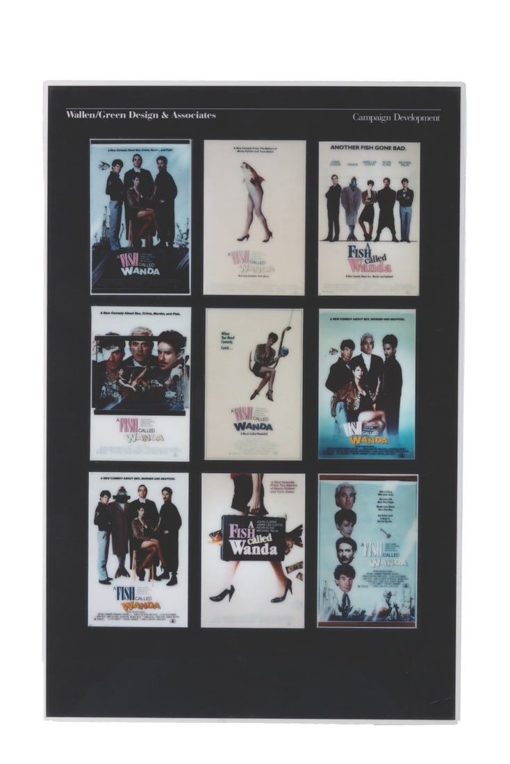 "A Fish Called Wanda" Movie Poster Presentation Board.: (MGM, 1988) A laminated presentation board of one-sheet variations for "A Fish Called Wanda." Measuring 11.25" x 17.25", the lamination board is in good production-used condition with scuffs,