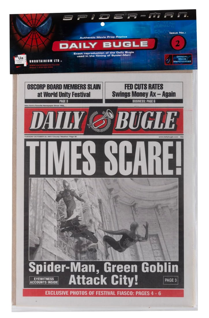 A "Spider-Man" Daily Bugle Prop Replica.: (Unobtanium, 2002) A replica of the Daily Bugle prop newspapers from the first "Spider-Man" live-action movie starring Tobey Maguire, Kirsten Dunst, and Willem Dafoe. Measuring 11.5" x 15" in its 12"