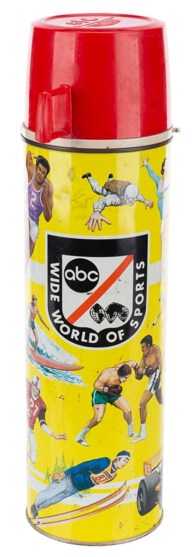 A 1976 ABC Wild World of Sports Thermos.: (ABC, 1976) A large ABC Wide World of Sports thermos with the show?s logo and painted images of athletes from many sports. Measuring 3.75" in diameter x 13.5" tall, the thermos displays in good