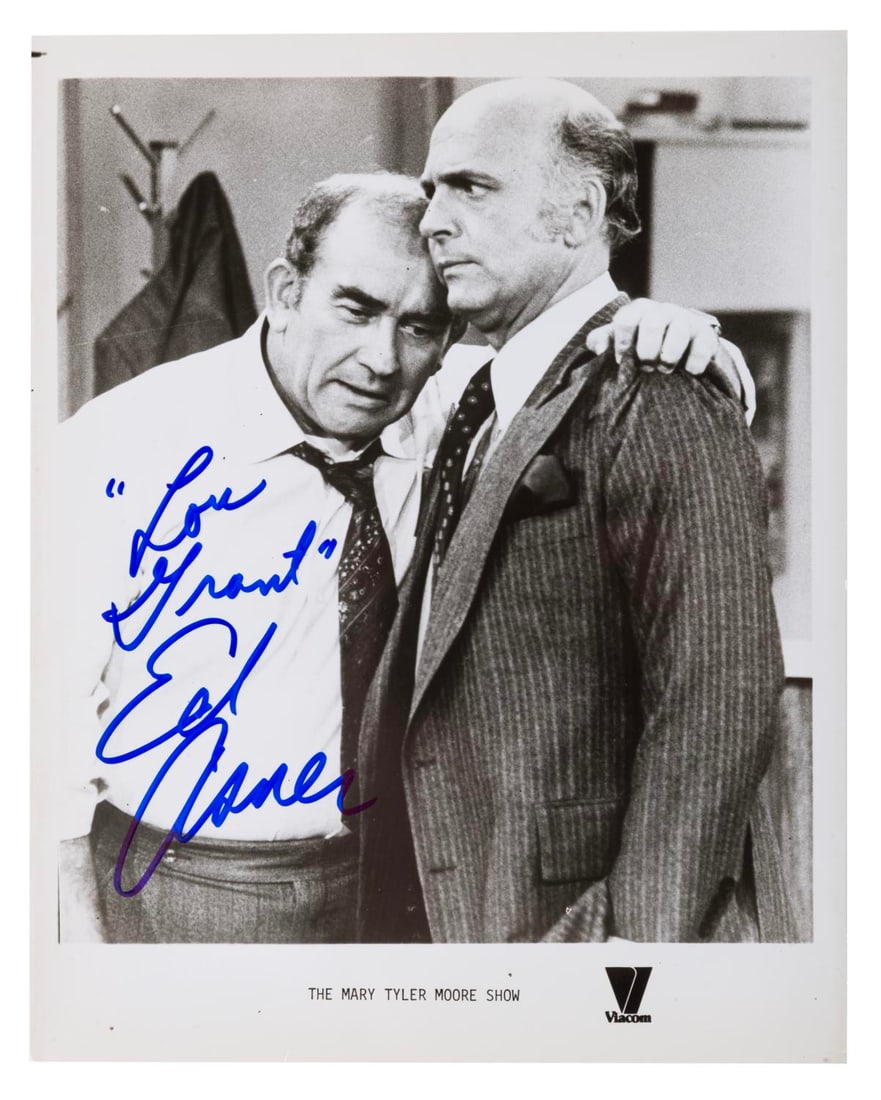An Ed Asner Signed "The Mary Tyler Moore Show" Photograph.: (CBS, 1970s ) An autographed photo of Ed Asner as Lou Grant on "The Mary Tyler Moore Show." The 8" x 10" photo is in very good condition with very slight wear from age.