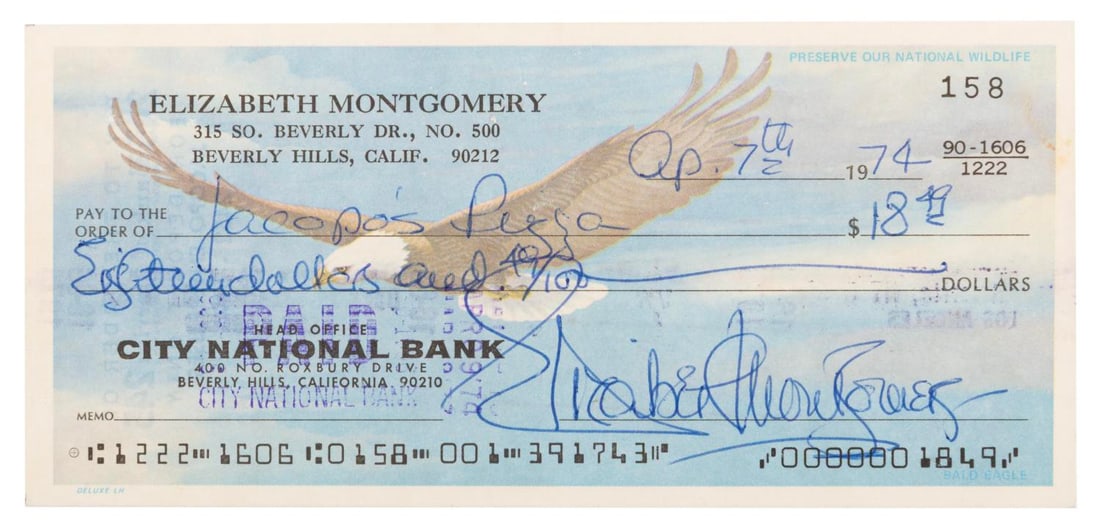 An Elizabeth Montgomery Signed Personal Check.: (Montgomery, 1974) A personal check made out to Jacopo's Pizza and signed by "Bewitched" star Elizabeth Montgomery, dated July 12, 1974. Measuring 2.75" x 6", the check is in very good condition with
