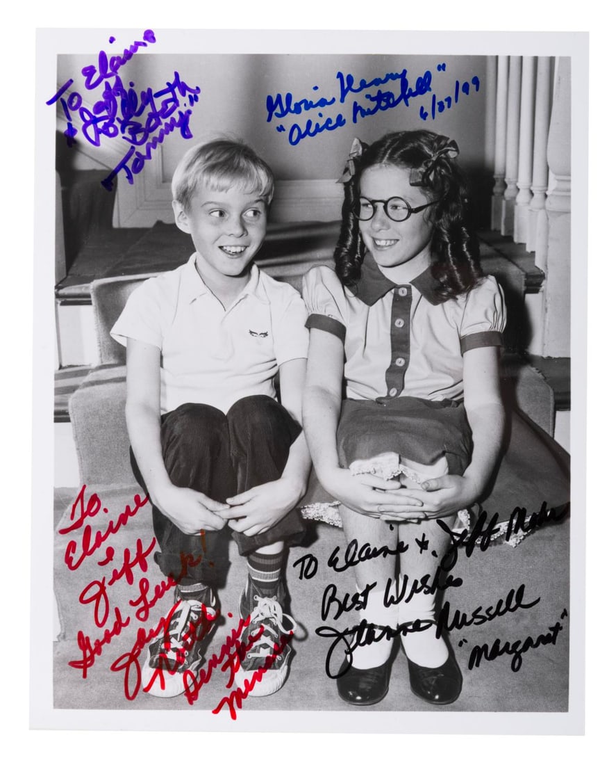 A Dennis the Menace Multi-Signed Photograph.: (CBS, 1990s) A photo of Dennis and Margaret from the 1959 sitcom Dennis the Menace, signed with dedications by four members of the show?s cast. Autographs include Jay North (Dennis), Jeannie Russell