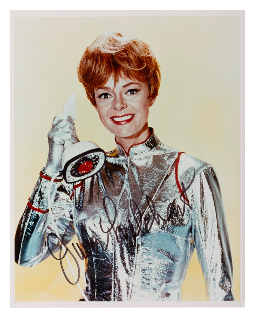 A June Lockhart Signed "Lost in Space" Photograph.: (CBS, 1965) A signed photograph of June Lockhart as Maureen Robinson in "Lost in Space." Measuring 8" x 10", the autographed photo is in fine condition with very light wear to the bottom corners.