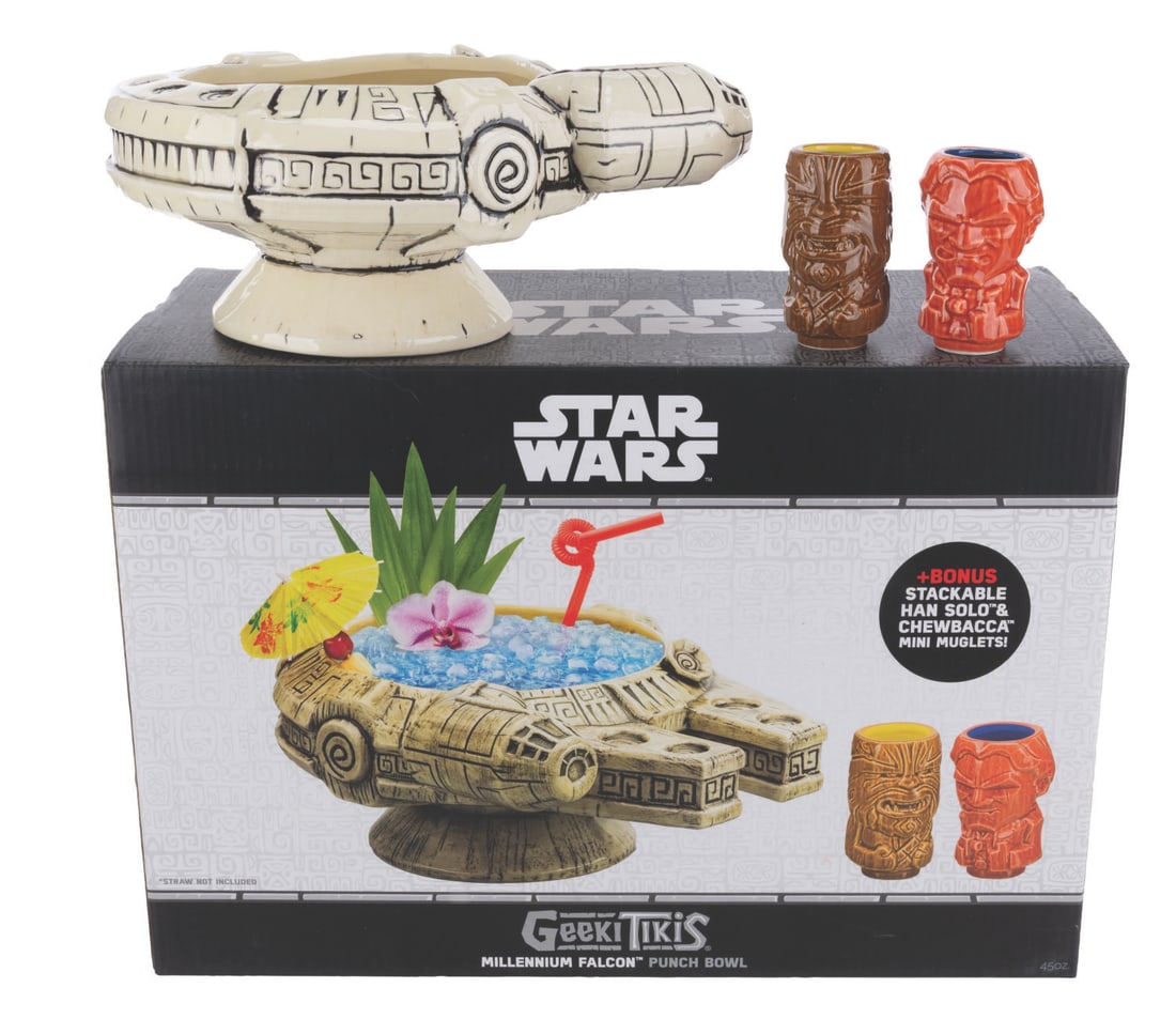 A Geeki Tikis Millennium Falcon Punch Bowl & Muglets Set.: (Geeki Tikis, 2019) A Millennium Falcon ceramic punch bowl set featuring muglets of Han Solo and Chewbacca, manufactured by Geeki Tikis. Ranging in size from the 3" tall and 1.5" in diameter muglets