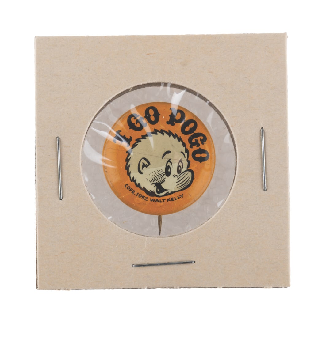 An "I Go Pogo" Button.: (Post-Hall Syndicate, 1952) An "I Go Pogo" button featuring the possum himself. Measuring 1" in diameter, the button is in very good condition.
