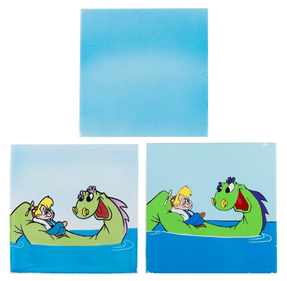 A Rare Set of Beany and Cecil Production Sample Tiles.: (Clampett, 1990s) A pair of decorative tiles of Beany and Cecil. These were samples made for a potential merchandise item, with both blue and black pupils on Beany. Also included is one matching