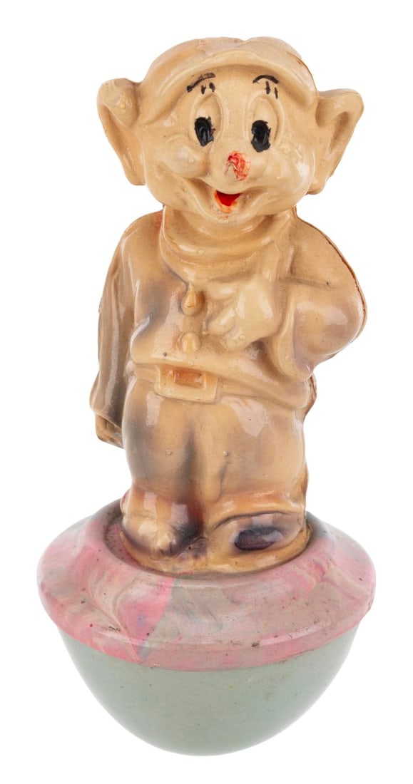 A "Snow White and the Seven Dwarfs" Dopey Wobble Toy. (1 of 6)