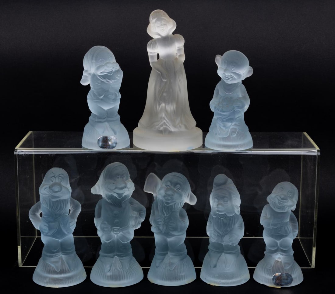 Italian Glass "Snow White and the Seven Dwarf" Figurines.: (American Cut Crystal Corp, 1980s) A set of eight glass figurines from "Snow White and the Seven Dwarfs," made in Italy. Included are all seven of the dwarfs in light blue frosted glass and Snow White