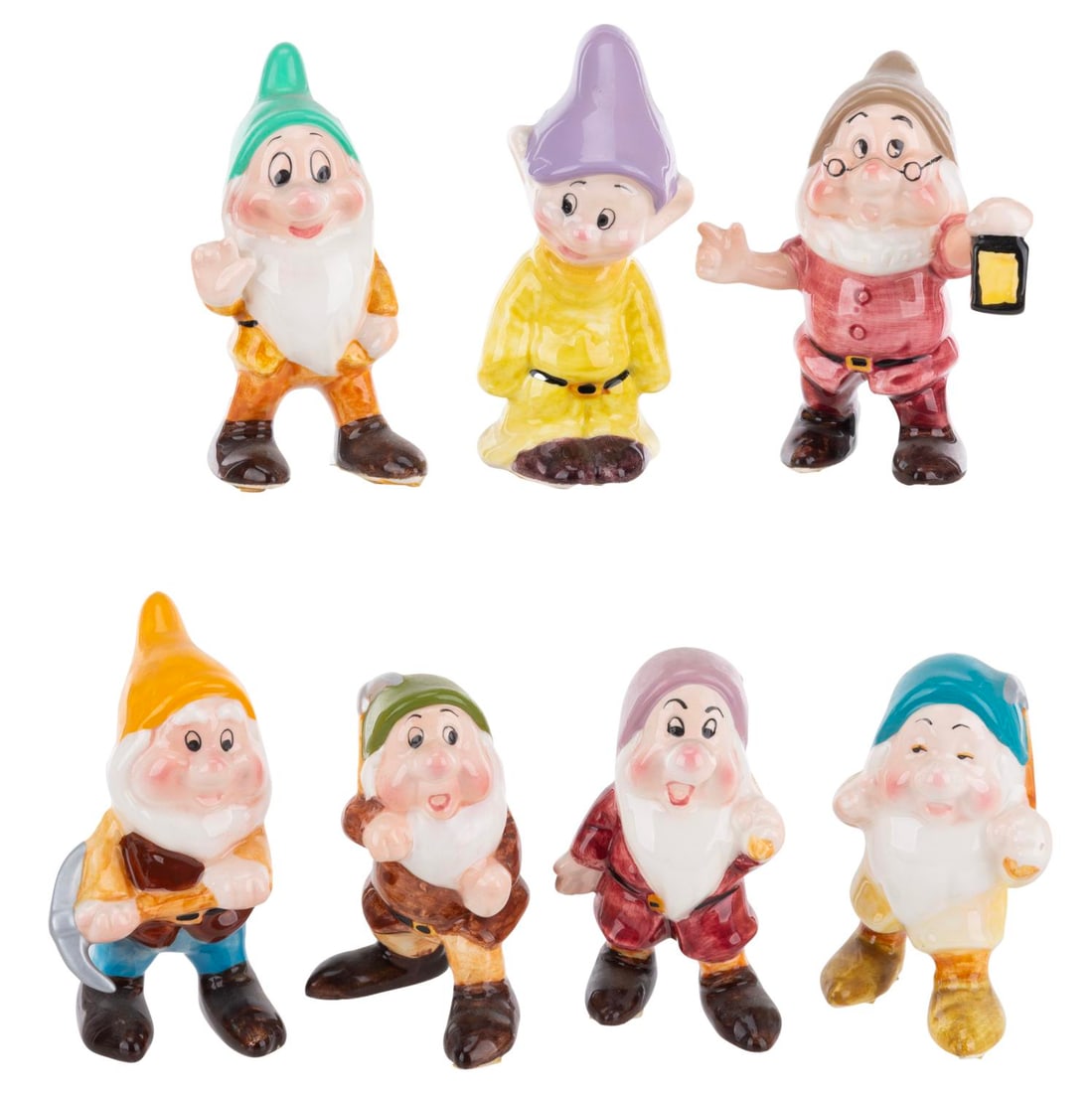 A "Snow White and the Seven Dwarfs" Ceramic Figurine Set. (1 of 2)