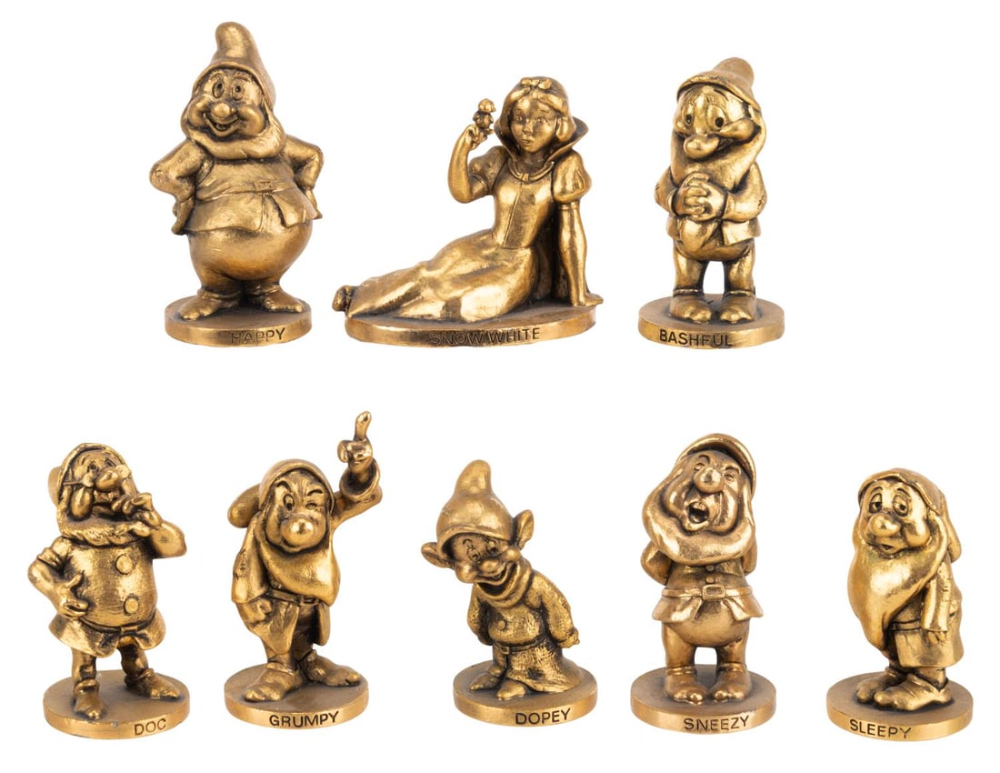 A "Snow White and the Seven Dwarfs" Fine Pewter Set.: (Schmid, 1980s) A complete set of eight "Snow White and the Seven Dwarfs" fine pewter figures by Schmid. Ranging from 1.75" tall and 2" in diameter to 1.75" x 1.25" x 1.5" tall, the figures are in ver