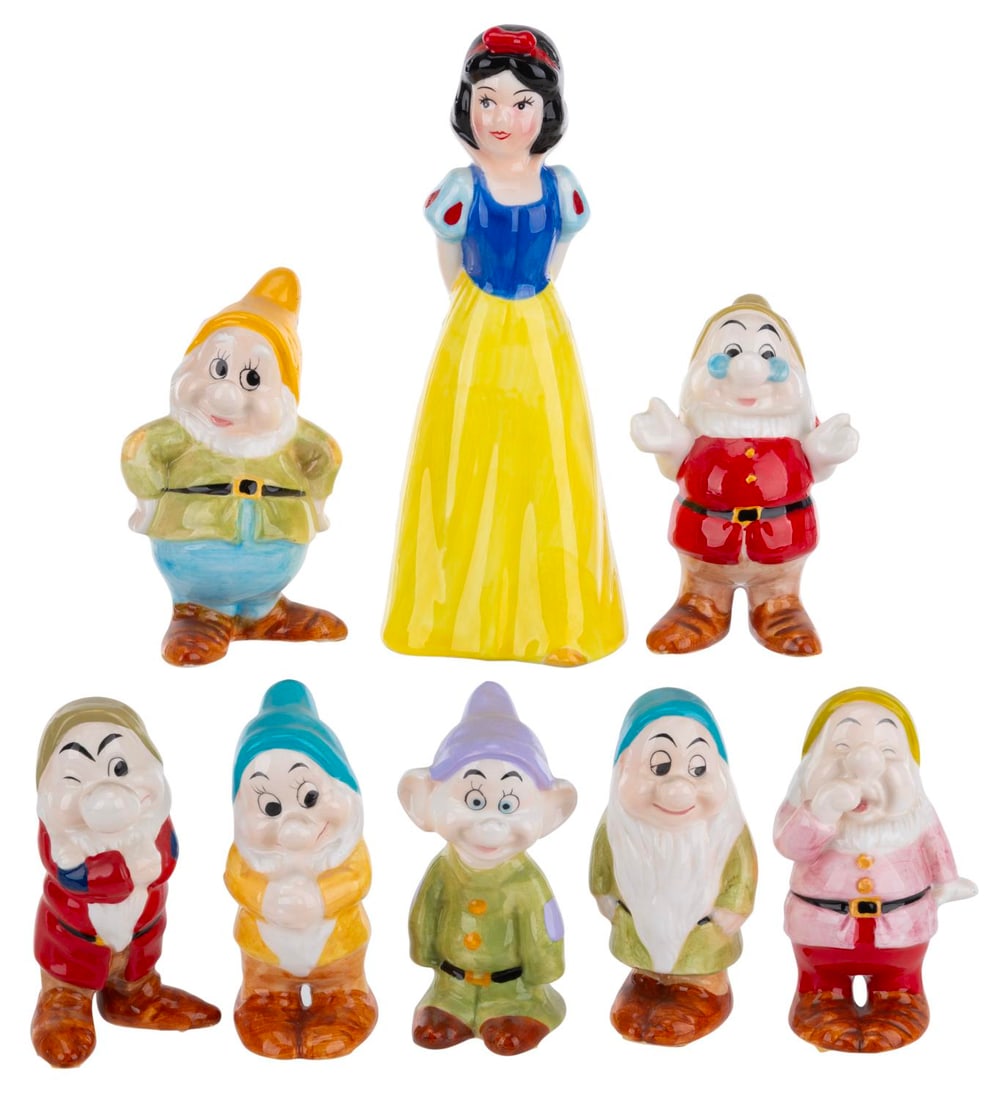 A "Snow White and the Seven Dwarfs" Ceramic Figurine Set. (1 of 2)