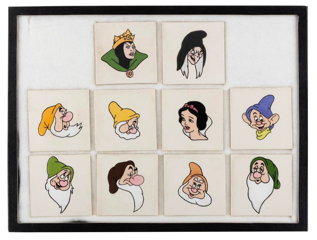 A Set of "Snow White and the Seven Dwarfs" Tiles.: (Disney, 1970s-80s) A rare set of 10 decorative tiles featuring hand-painted reliefs of Snow White, the Seven Dwarfs, and the Wicked Queen in both her forms. The decorative tiles were produced with a