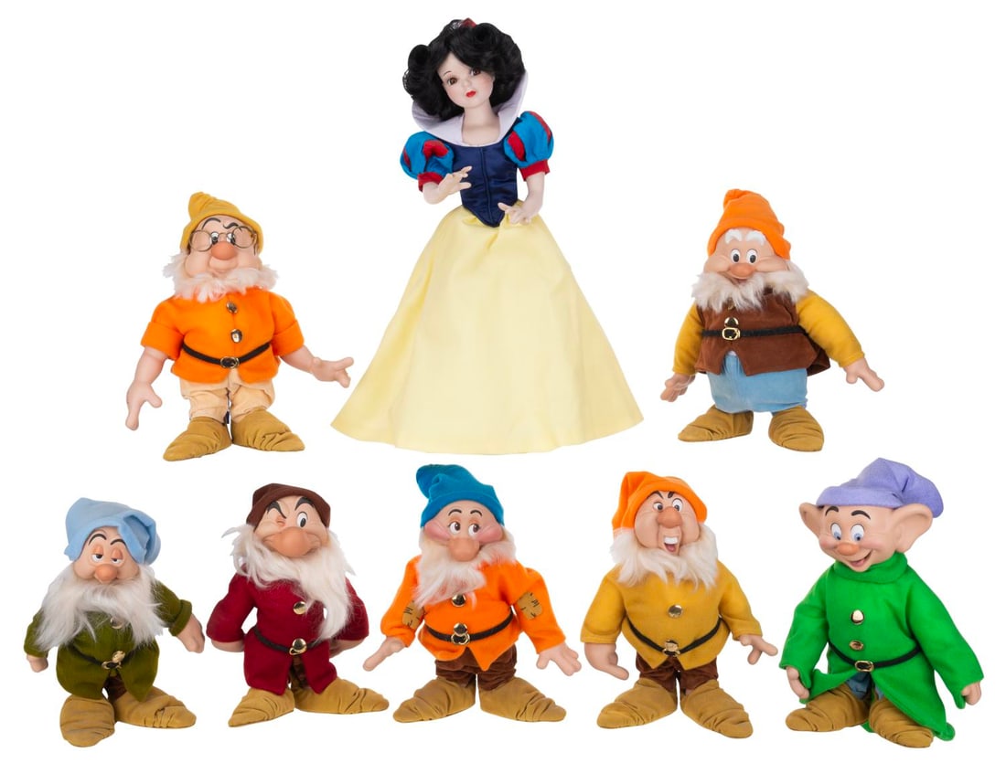 A Set of "Snow White and the Seven Dwarfs" Porcelain Dolls.: (Disney, 1990s) A set of eight "Snow White and the Seven Dwarfs" porcelain dolls. Snow White was released in a limited edition of 5000 at the Disney Store, while the Dwarfs are numbered 287/2500.