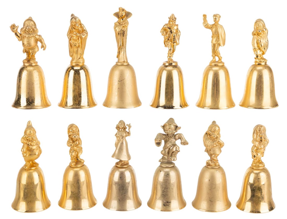 A Set of "Snow White and the Seven Dwarfs" Bells.: (New England Collector's Society, 1987) A complete set of 12 "Snow White and the Seven Dwarfs" bells from the New England Collector's Society. Included are Snow White, the Seven Dwarfs, the Evil