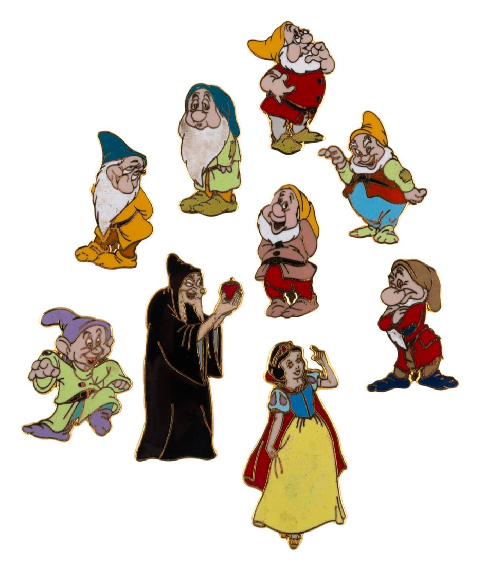 A Cast Member Exclusive "Snow White" 50th Anniversary Pin Set.: (Disney, 1980s-90s) A nine-piece Cast-Member exclusive "Snow White and the Seven Dwarfs" pin set, celebrating the film?s 50th Anniversary. Included are Snow White, the Old Hag, and the seven Dwarfs.