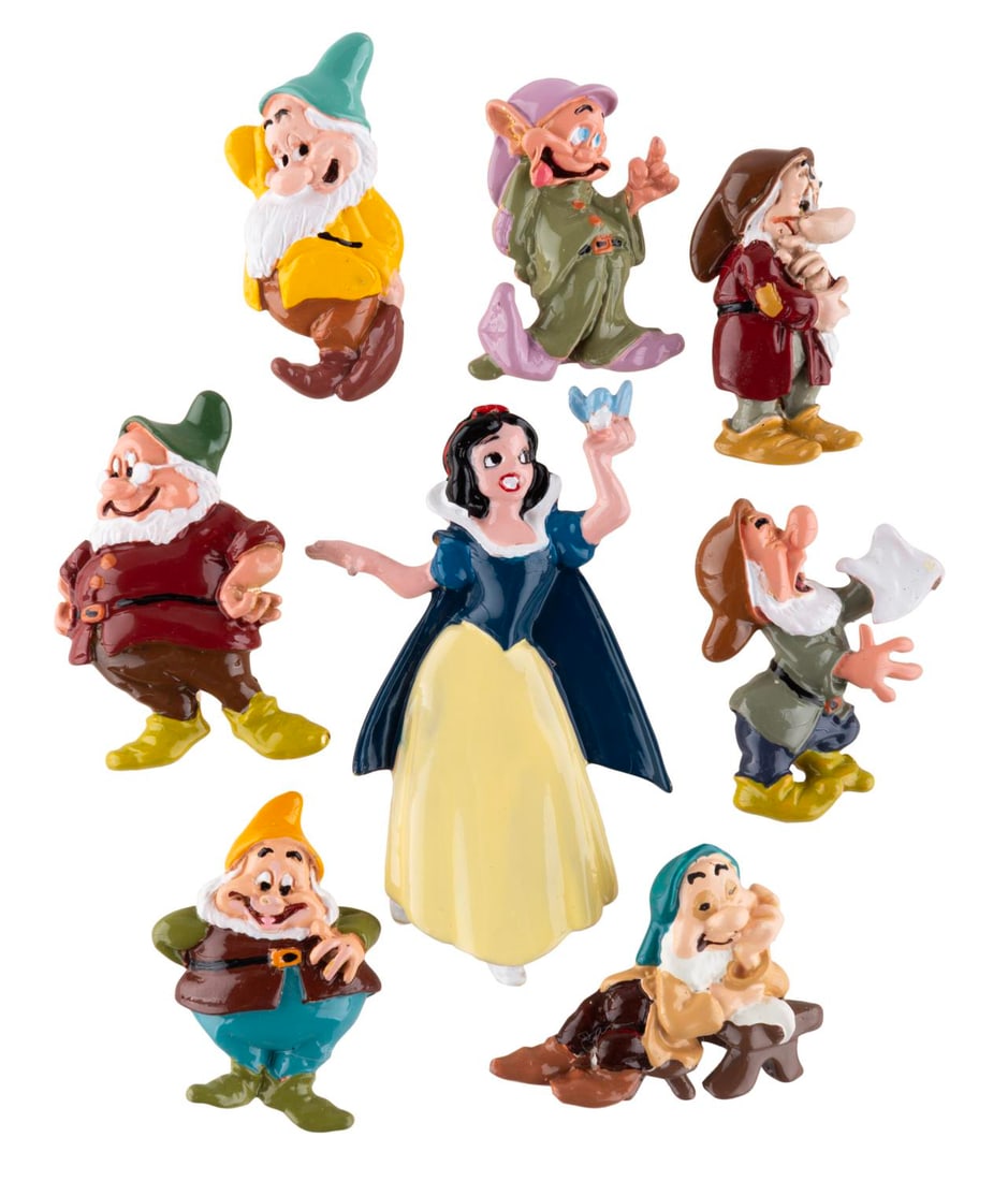 A Set of "Snow White" Wendy Gell Brooches.: (Wendy Gell, 1980s-90s) An eight-piece "Snow White and the Seven Dwarfs" brooch set by jewelry artist Wendy Gell. Measuring 1" to 2.75" tall, the set is in good condition with light soiling and