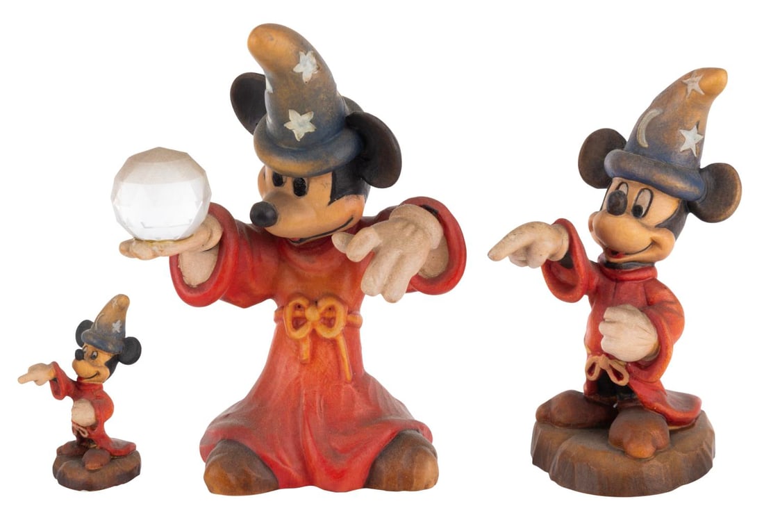 Three "Fantasia" Sorcerer Mickey Figurines by ANRI.: (ANRI, 1980s-90s) Three miniature wooden "Fantasia" Sorcerer Mickey figurines by ANRI of Italy. Measuring 1.6" to 4" tall, the figurines are in very good condition with heavy soiling.