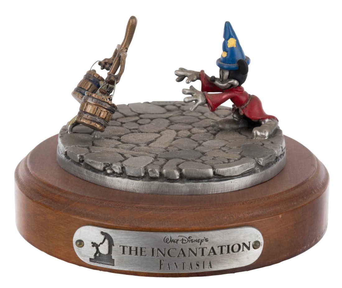 A "The Incantation" Sorcerer Mickey Sculpture.: (Hudson, 1990s-2000s) A pewter sculpture of Sorcerer Mickey titled "The Incantation," inspired by Walt Disney's "Fantasia." Numbered 113/2500, the sculpture measures 3" tall and 5" in diameter, and