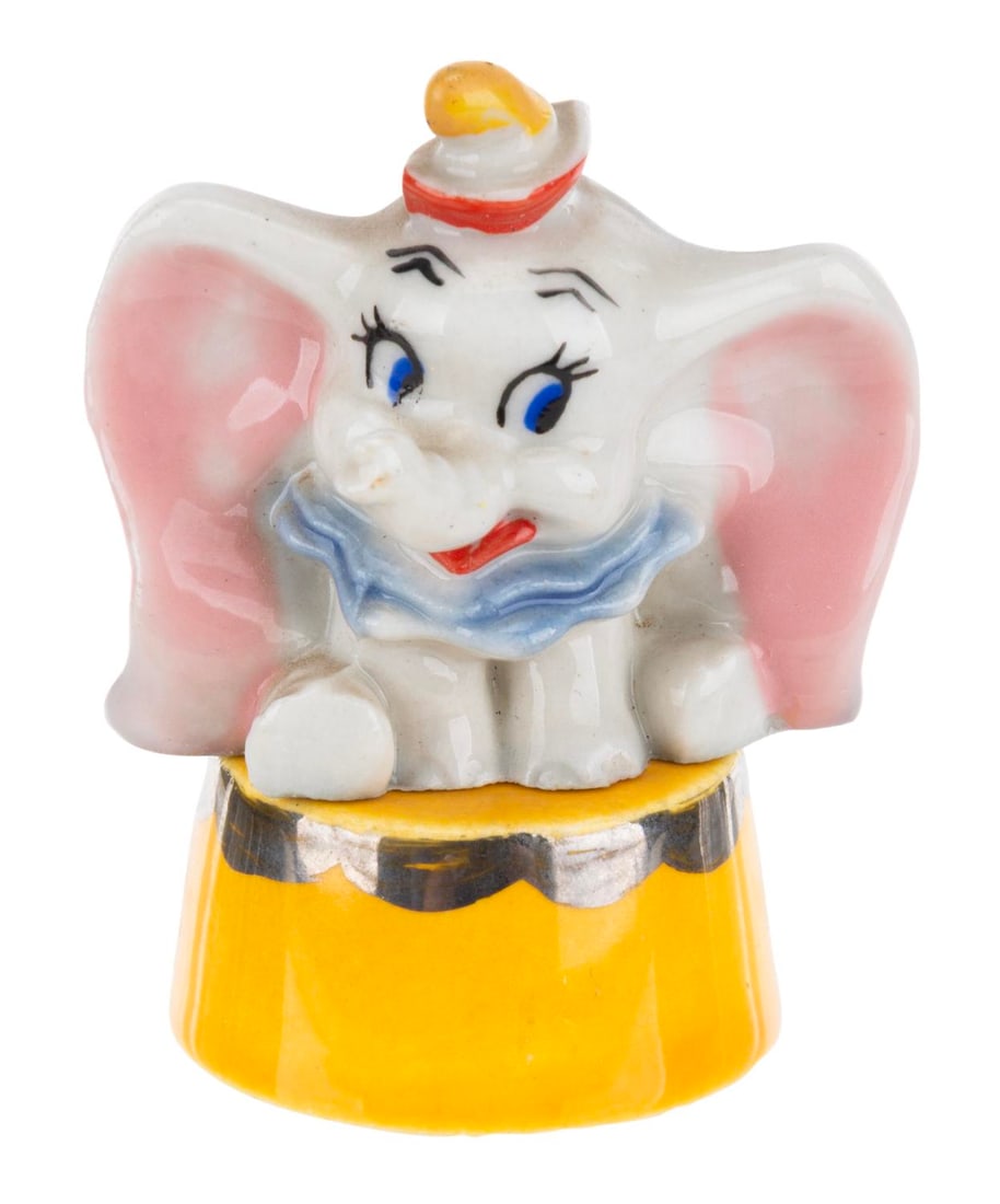 A "Dumbo" Ceramic Figure with Pedestal. (1 of 5)