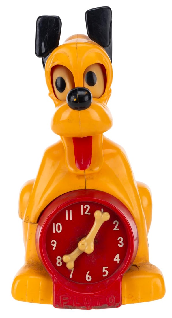 A Pluto Figural Clock.: (Allied, 1950s) A Pluto figural clock manufactured by Allied. The clock did not work when tested, likely requiring repair for function. Measuring 9" tall, the clock displays in good condition with