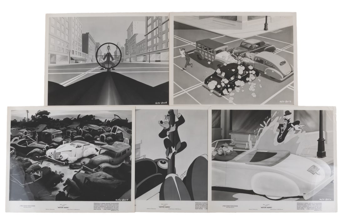A Collection of "Motor Mania" Publicity Photos.: (Disney, 1950) A collection of publicity photos for the Goofy animated short "Motor Mania." Measuring 8.25" x 10", the publicity photos are in good condition with scratches, creases, edge tears, and