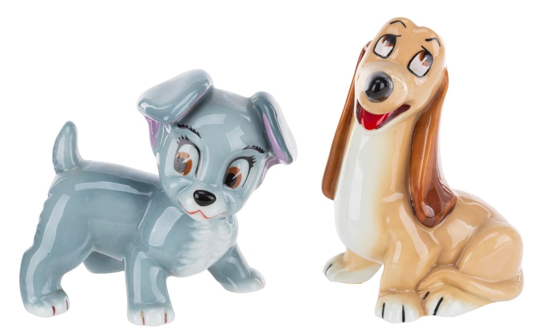 A Pair of "Lady and the Tramp" Porcelain Figurines.: (Wade, 1950s) A pair of figurines of Scamp and Dachie from "Lady and the Tramp," manufactured by Wade Porcelain of England. Ranging in size from 4.5" x 2.5" x 4" to 3.75" x 2.5" x 5" tall, the figurin