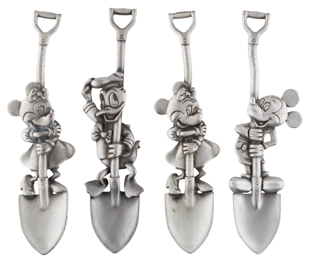 A Collection of Pewter Character Shovel Spoons. (1 of 1)