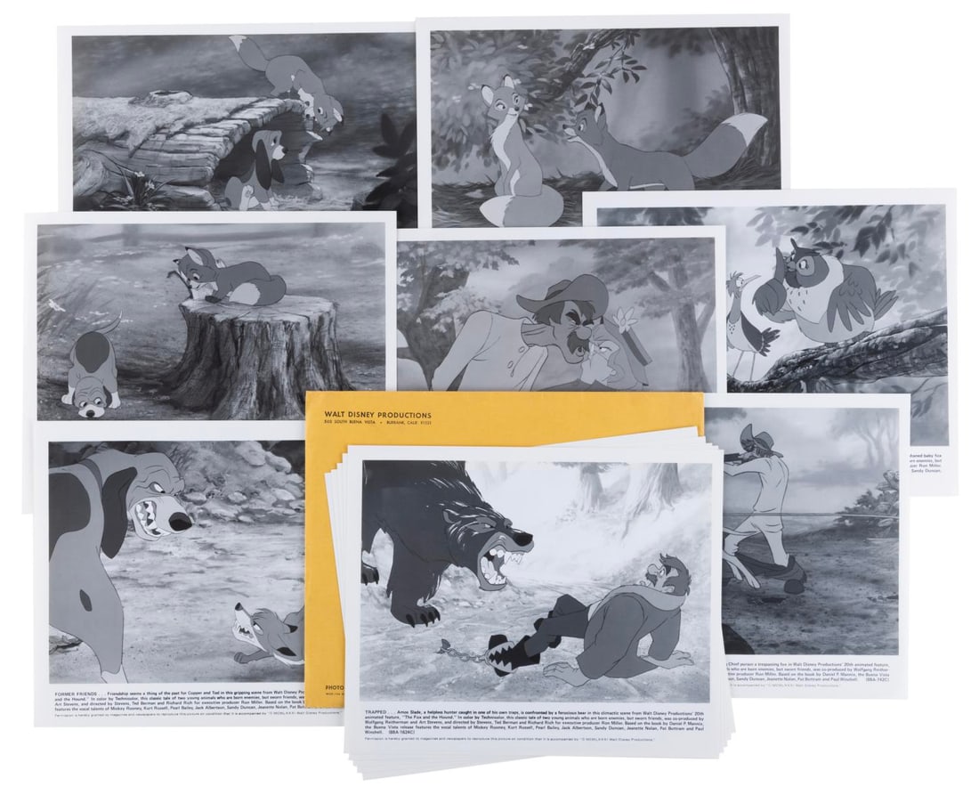 A Set of 12 "The Fox and the Hound" Publicity Photos.: (Disney, 1981) A set of 12 publicity photos with captions from "the Fox and the Hound." The set is in a Walt Disney Productions manila envelope labeled as the film?s "Set A." Each measuring 8" x 10", 