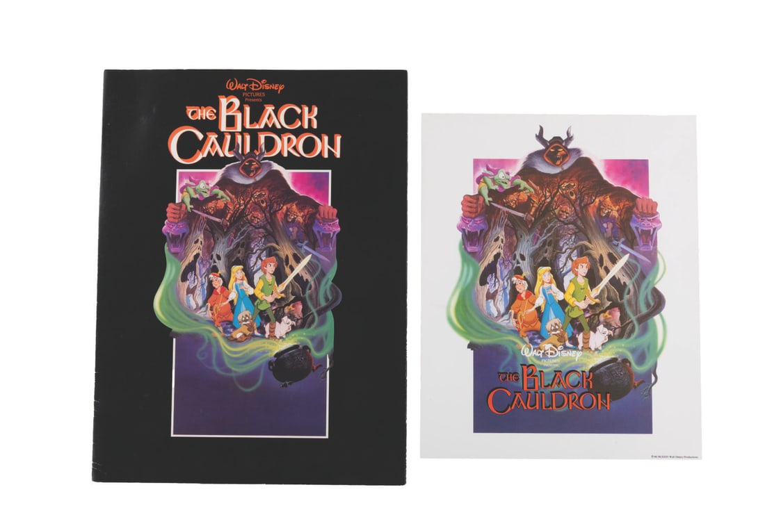 A "The Black Cauldron" Program and Fan Card.: (Disney, 1985) A program and fan card for "The Black Cauldron." Measuring 8" x 10", the fan card is in fine condition, while the 9" x 12" program is in good condition with scratches and wear.
