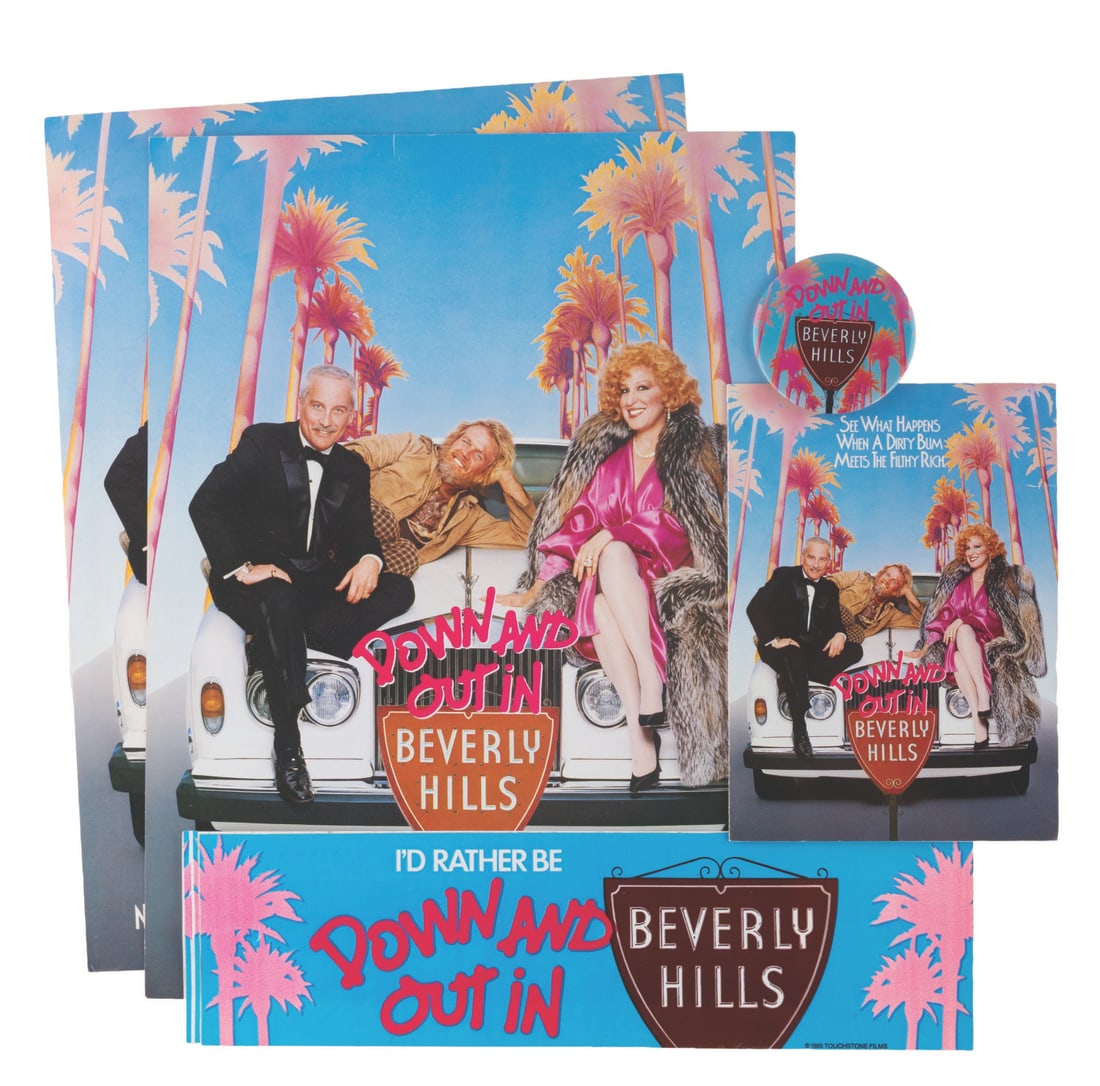 A "Down and Out in Beverly Hills" Souvenir Collection.: (Touchstone, 1986) A collection of "Down and Out in Beverly Hills" souvenirs including a premiere invitation, two programs, a button, and a bumper sticker. Ranging in size from the 2.25" in diameter
