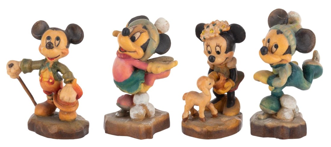 A Set of Four Miniature Mickey and Minnie Figurines by ANRI.: (ANRI, 1980s-90s) A set of four miniature wooden Mickey and Minnie Mouse figurines by ANRI of Italy. Measuring 1.25" to 2.25" tall, the figurines are in very good condition with light soiling and